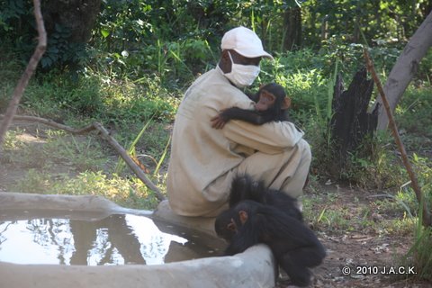 Papa Augustin and Pundu in his arms